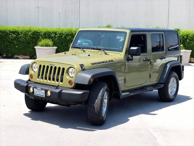 used 2013 Jeep Wrangler Unlimited car, priced at $16,995