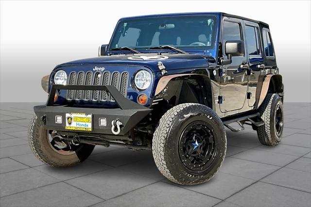 used 2013 Jeep Wrangler Unlimited car, priced at $15,988