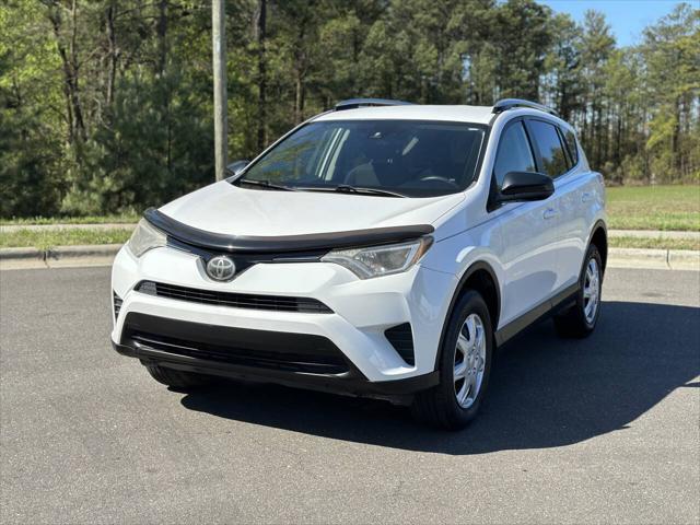 used 2018 Toyota RAV4 car, priced at $14,900