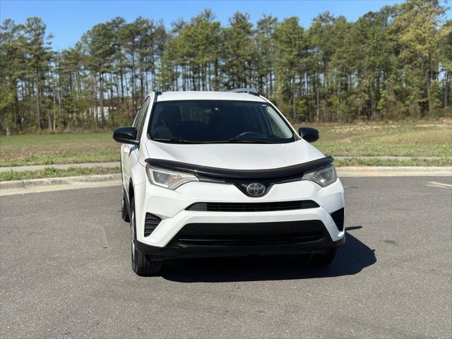 used 2018 Toyota RAV4 car, priced at $14,900