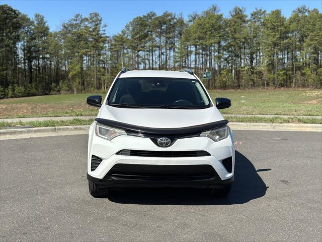 used 2018 Toyota RAV4 car, priced at $14,900