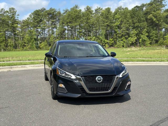 used 2021 Nissan Altima car, priced at $15,000