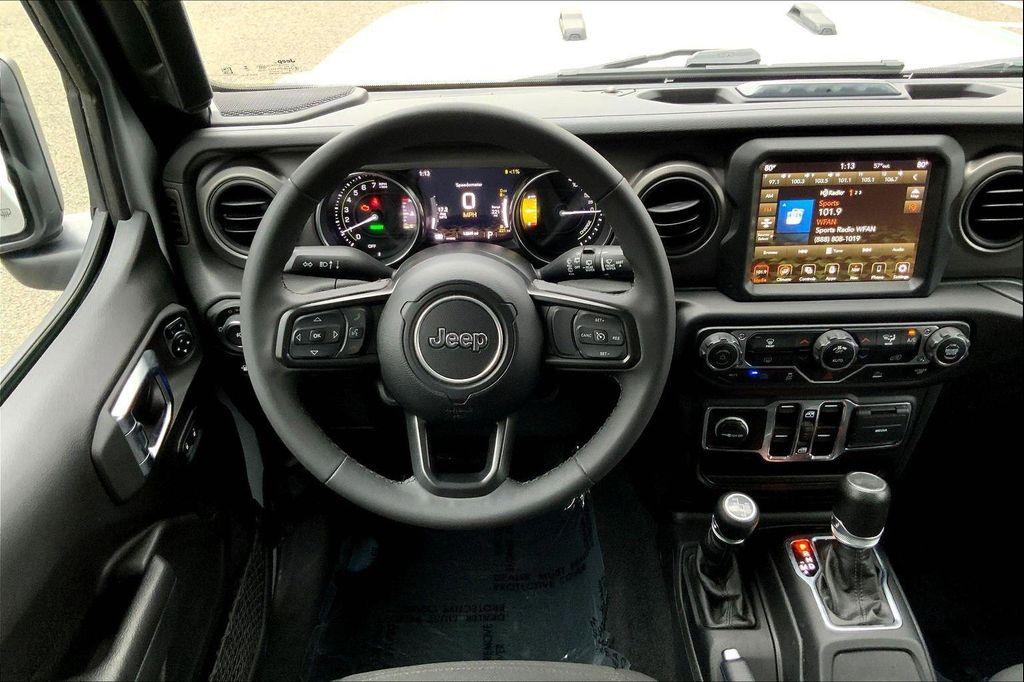 used 2023 Jeep Wrangler 4xe car, priced at $33,490