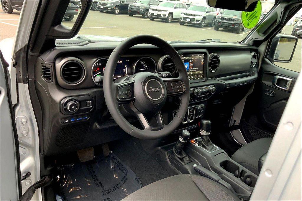 used 2023 Jeep Wrangler 4xe car, priced at $33,490