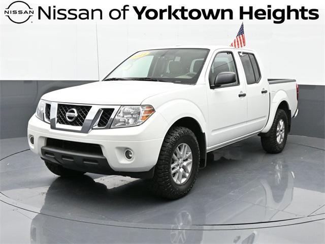 used 2014 Nissan Frontier car, priced at $15,495
