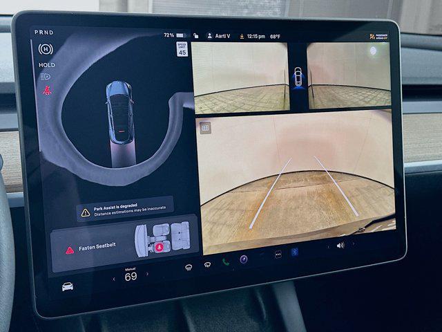 used 2024 Tesla Model Y car, priced at $31,197