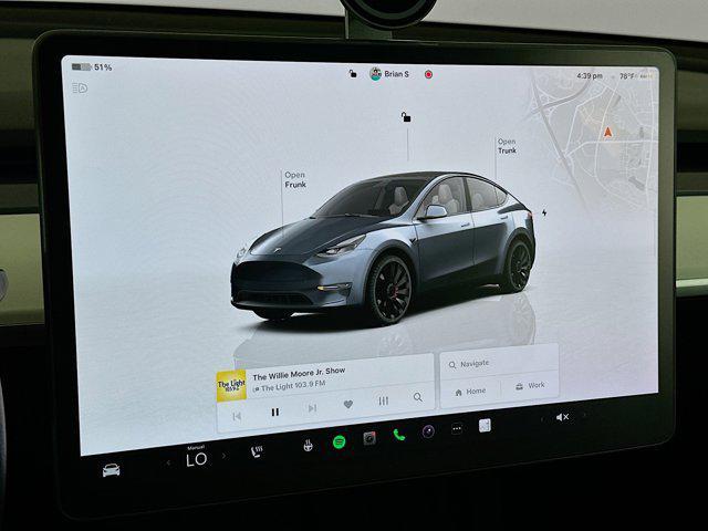used 2023 Tesla Model Y car, priced at $30,497