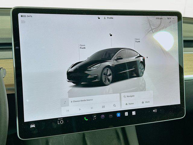used 2023 Tesla Model 3 car, priced at $27,697