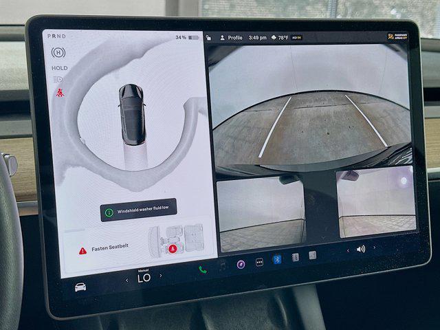 used 2023 Tesla Model 3 car, priced at $27,697