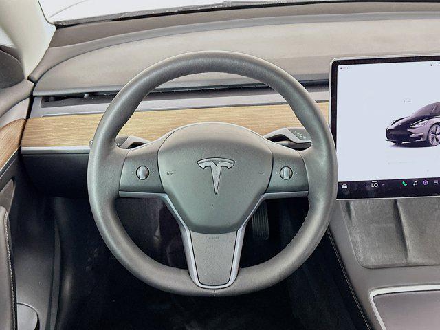 used 2023 Tesla Model 3 car, priced at $27,697