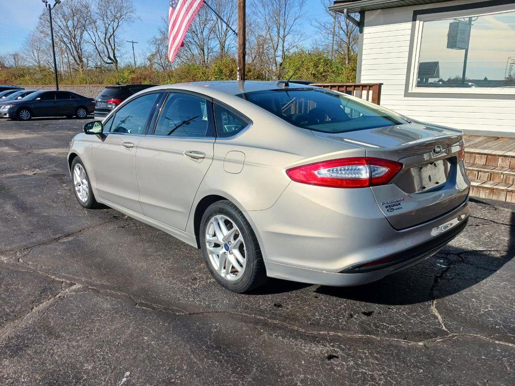 used 2015 Ford Fusion car, priced at $9,900