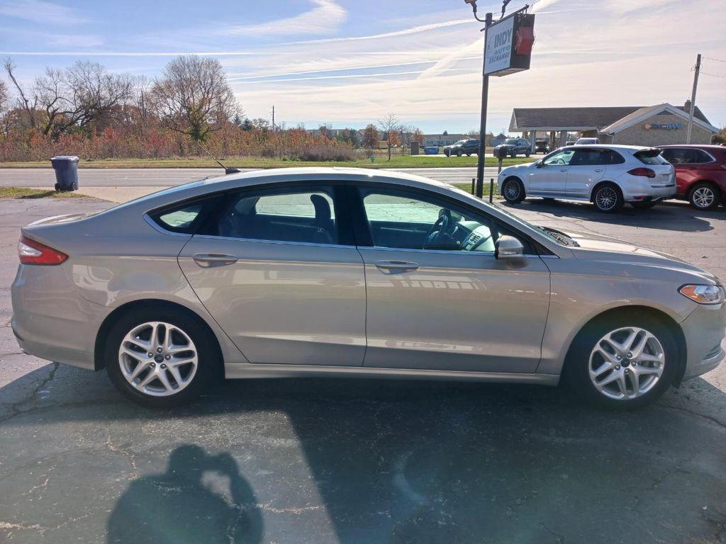 used 2015 Ford Fusion car, priced at $9,900