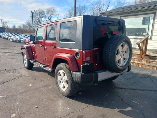 used 2009 Jeep Wrangler Unlimited car, priced at $10,900