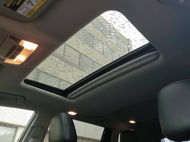 used 2019 Toyota Highlander Hybrid car, priced at $28,490