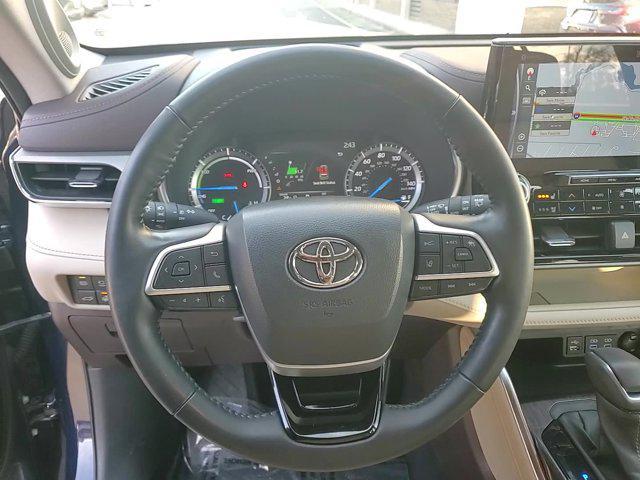 used 2022 Toyota Highlander Hybrid car, priced at $35,490