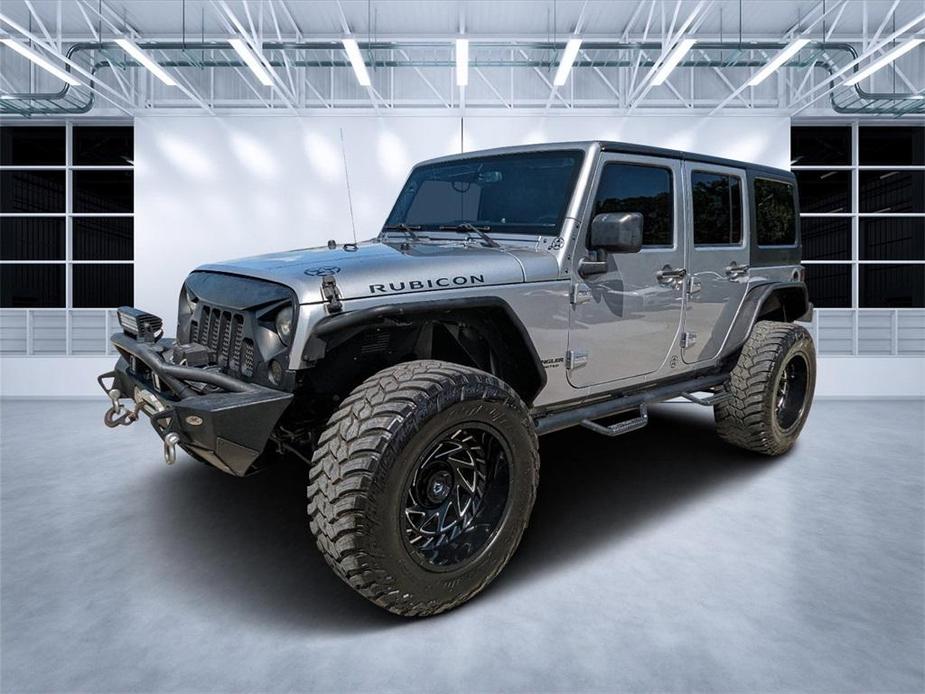 used 2015 Jeep Wrangler Unlimited car, priced at $21,997