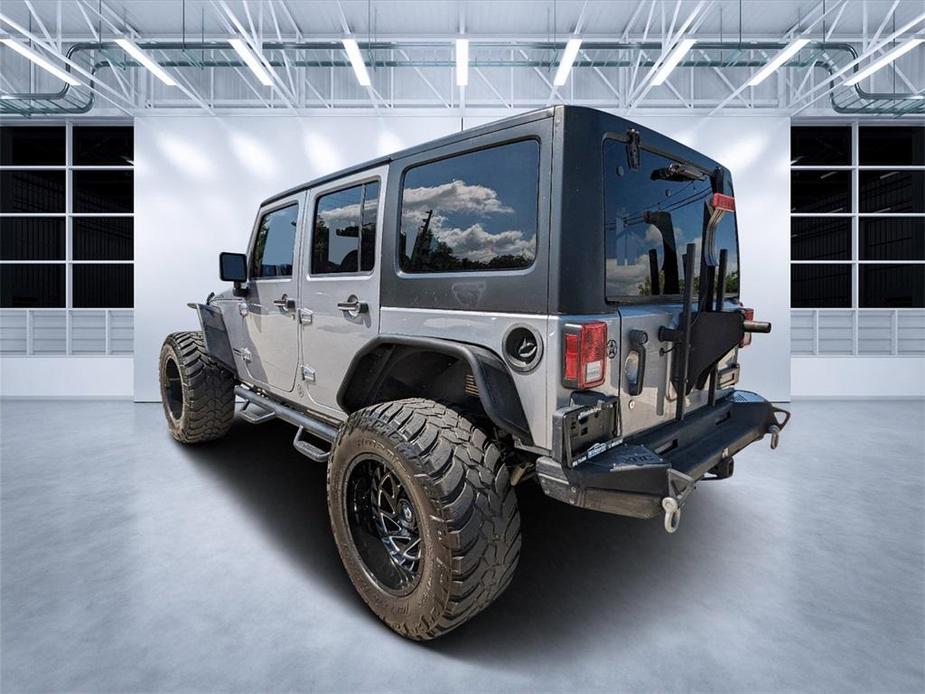 used 2015 Jeep Wrangler Unlimited car, priced at $21,997