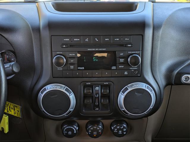 used 2015 Jeep Wrangler Unlimited car, priced at $20,399