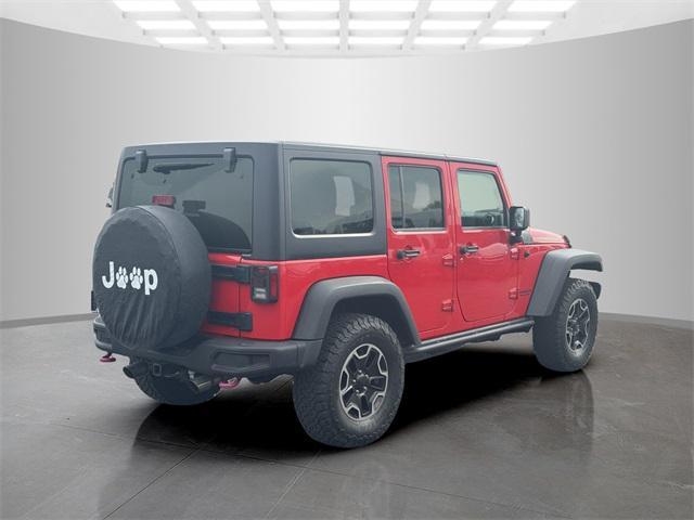 used 2015 Jeep Wrangler Unlimited car, priced at $23,458