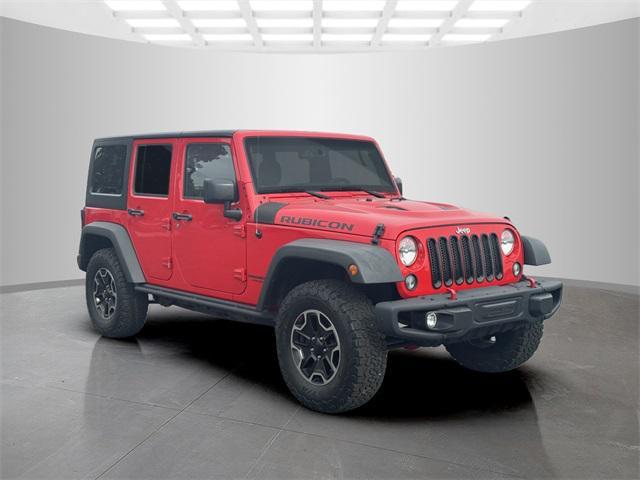 used 2015 Jeep Wrangler Unlimited car, priced at $23,458