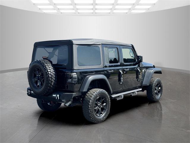 used 2021 Jeep Wrangler Unlimited car, priced at $29,458