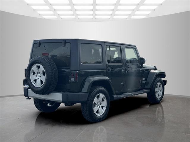 used 2011 Jeep Wrangler Unlimited car, priced at $15,899