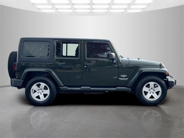 used 2011 Jeep Wrangler Unlimited car, priced at $15,899