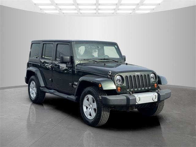 used 2011 Jeep Wrangler Unlimited car, priced at $15,899