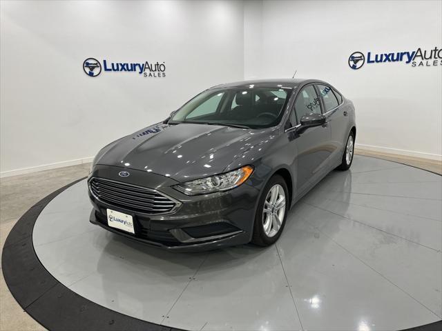 used 2018 Ford Fusion car, priced at $14,988