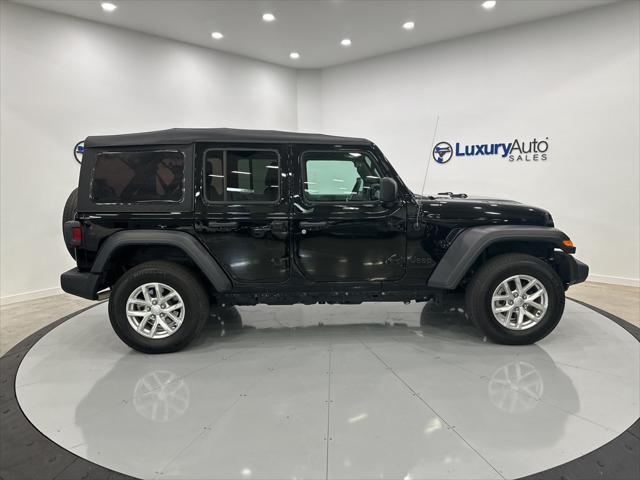 used 2023 Jeep Wrangler car, priced at $32,386