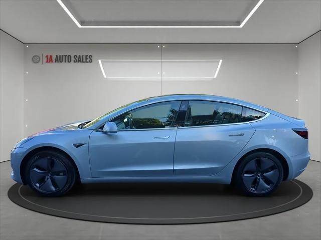 used 2018 Tesla Model 3 car, priced at $23,495