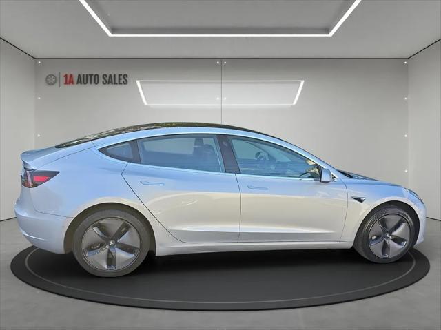 used 2018 Tesla Model 3 car, priced at $23,495