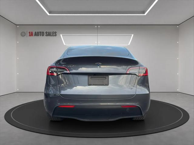 used 2021 Tesla Model Y car, priced at $31,495