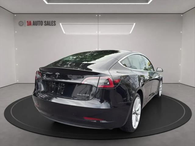 used 2018 Tesla Model 3 car, priced at $13,995