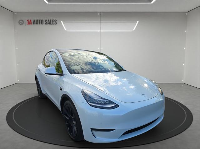 used 2021 Tesla Model Y car, priced at $30,495