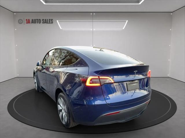 used 2023 Tesla Model Y car, priced at $36,495