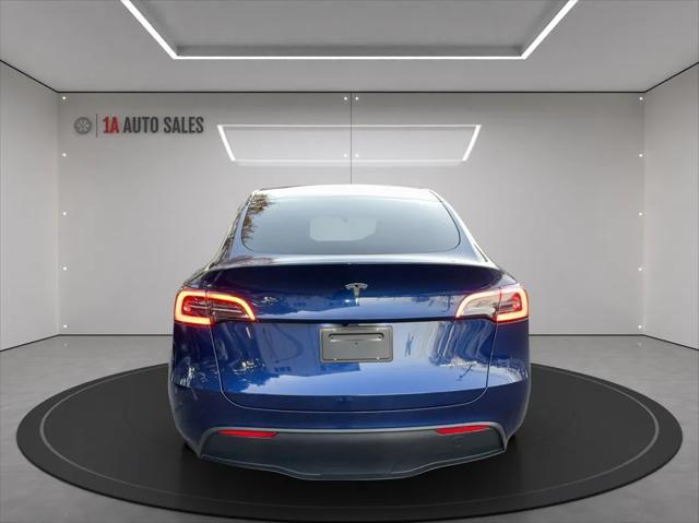 used 2023 Tesla Model Y car, priced at $36,495