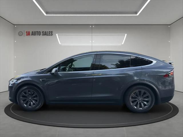 used 2018 Tesla Model X car, priced at $31,495