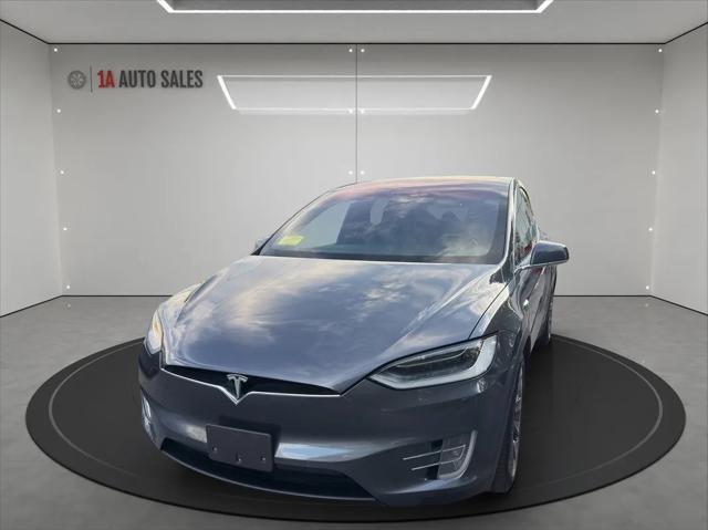 used 2018 Tesla Model X car, priced at $31,495