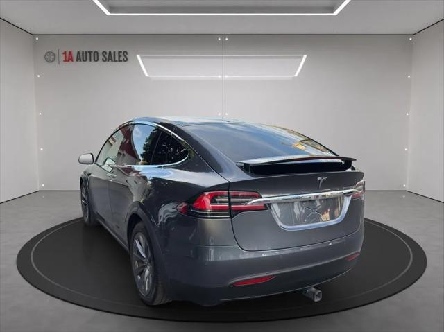 used 2018 Tesla Model X car, priced at $31,495