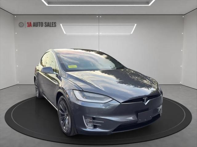 used 2018 Tesla Model X car, priced at $31,495