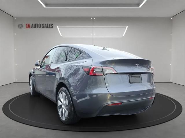 used 2023 Tesla Model Y car, priced at $35,995