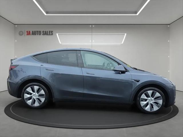 used 2023 Tesla Model Y car, priced at $35,995