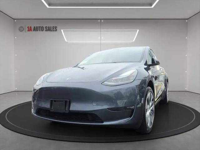 used 2023 Tesla Model Y car, priced at $35,995