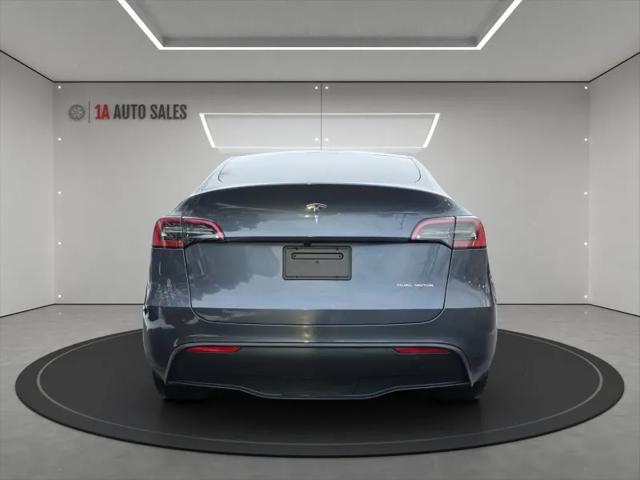 used 2023 Tesla Model Y car, priced at $35,995