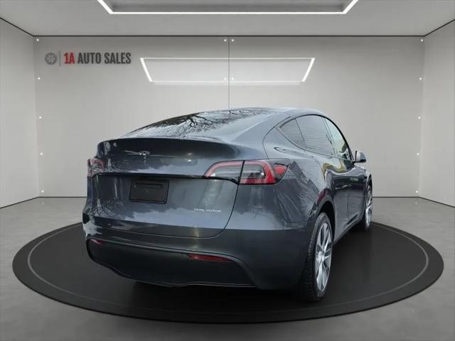 used 2023 Tesla Model Y car, priced at $35,995