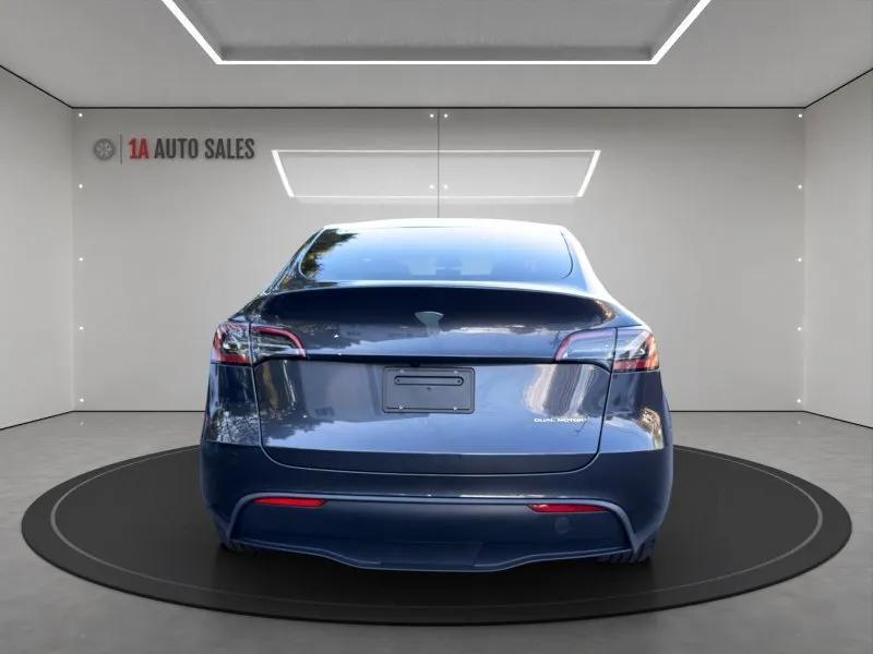 used 2024 Tesla Model Y car, priced at $38,995
