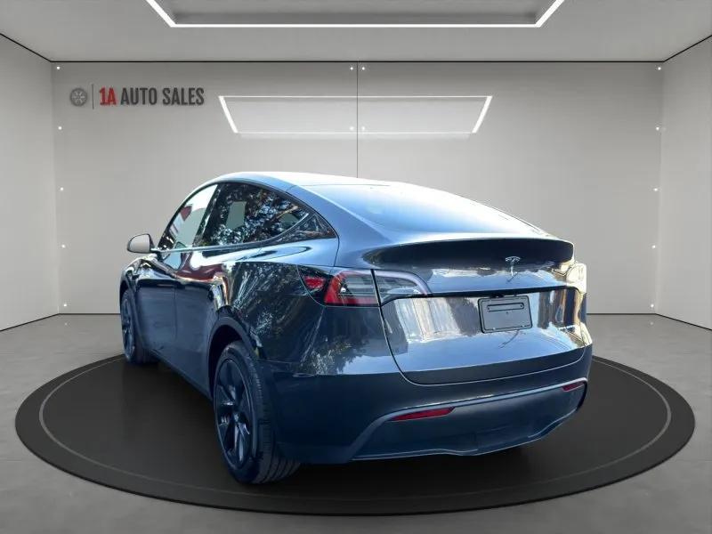 used 2024 Tesla Model Y car, priced at $38,995