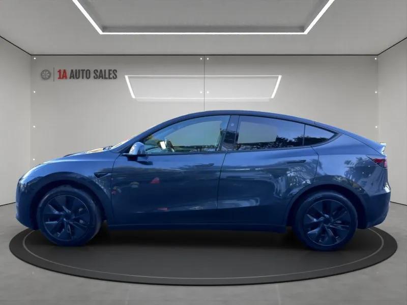 used 2024 Tesla Model Y car, priced at $38,995