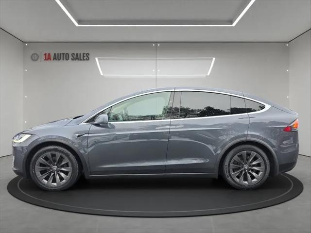 used 2018 Tesla Model X car, priced at $39,995